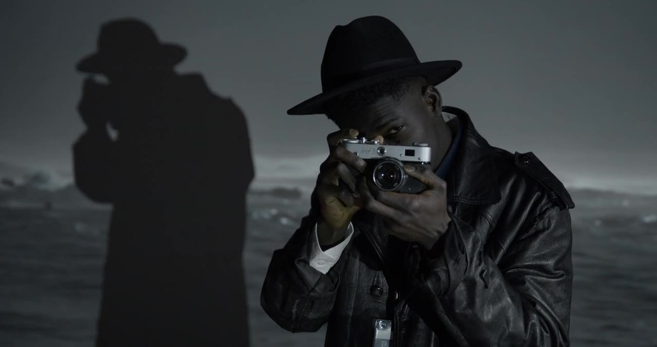 Man taking pictures, by cottonbro studio, on Pexels